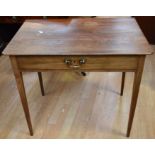 A late George III mahogany hall table on tapered legs and with a single front drawer