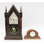 An Edwardian mahogany mantel clock, together with a late 19th century German mantel clock