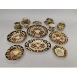 A collection of Royal Crown Derby 2451 and other patterns, to include pin dishes, plates, cups, posy