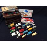 A collection of Corgi cars, boxed and loose, together with a collection of books such as the