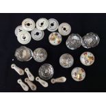 A collection of ceramic door knobs