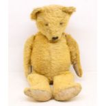 Chiltern: An early 20th century, Chiltern, straw-filled teddy bear, circa 1930s, no labels. Height