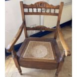 Vintage commode chair with original Bristol Pot and Cover.  THIS ITEM IS OFF SITE AND SHOULD BE