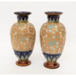 A pair of early 20th Doulton Lambeth vases