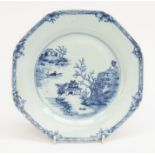 A Chinese armorial blue and white hexagonal plate, willow pattern, geometric and floral border,