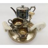 A silver plate tea set, tray and candlestick, together with a Copenhagen polar bear and another