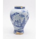 A mid to late 17th century Continental Delft vase decorated with a Continental scene
