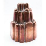 A mid 19th century copper jelly mould