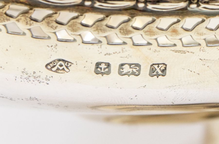 A George V silver swing handle bread basket, with pierced work and engraved inscription "Presented - Image 2 of 2