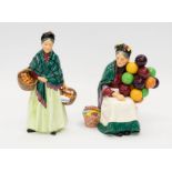 Two Royal Doulton figurines - 'The Balloon Seller' and 'The Orange Lady'