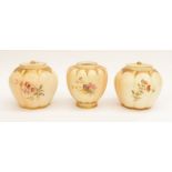 Three Royal Worcester blush ivory jars to include; a lidded porcelain jar in lobed form with