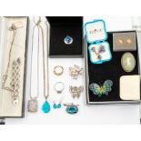 A collection of costume jewellery to comprising silver jewellery to include silver bracelet, ingot