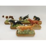 A collection of six Royal Worcester 'Sporting Dogs' set including; Irish Setter, Springer Spaniel,