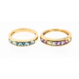 Two channel set 9ct gold rings, to include one set with blue topaz, size M, the other set  with