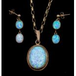 A synthetic opal and 9ct gold oval pendant approx 18 x 22mm, suspended from a 9ct gold belcher