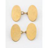 A pair of 9ct gold gents oval cufflinks, plain, weight approx 4.8gms  further details: wear and tear