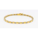 A diamond and 18ct gold bracelet, comprising alternate square white gold links set to the centre