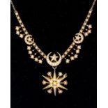 An Edwardian pearl and 15ct gold necklace, comprising three graduated pearl set crescent star