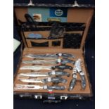 A complete set of chef's knives by Kaiserbach in a brief case