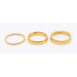 Three 22ct rings, combined weight approx 8.2gms