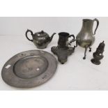 A collection of 19th and early 20th century English pewter wares, i.e. plates, teapots, tankards,