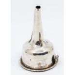 A 19th Century silver plated wine funnel with strainer, engraved with a crest, unmarked. Approx.