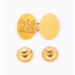 Two 18ct gold dress studs and a 18ct gold cufflink, combined with engraved cote of arms, griffin and