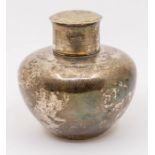 An early 20th Century Chinese Export silver hammered tea canister and cover, baluster shape, the