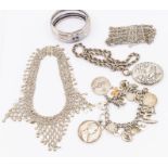 A collection of silver and white metal jewellery to include a white metal Victorian bangle with