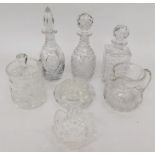 A collection of various cut glass and crystal decanters, bowls etc