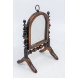 An apprentice piece of a George III mahogany toilet mirror, with original looking glass