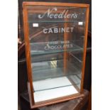 An early to mid 20th century Needler's fresh-made chocolate glazed display cabinet