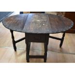 An 18th century oak dropleaf table with carved edge, together with an Edwardian oak overmantel