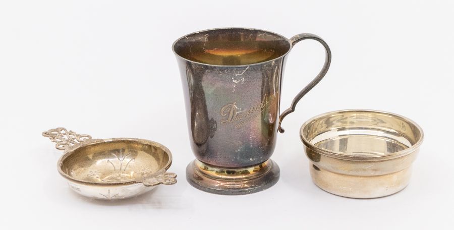 A Birmingham silver tea strainer and bowl, with stylised handles to strainer and both hallmarked