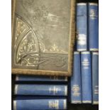 A collection of fifteen Charles Dickens blue leather bound books, to include; Little Dorrit,