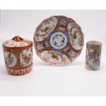 A Chinese Canton Famille Rose brush pot (unmarked),  an Imari dish and a Japanese lidded pot, marked