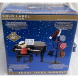 Collectable: Mr Christmas ‘Teddy takes requests’ musical Teddy playing Piano. Seven different hats