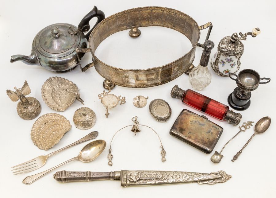 A collection of silver and silver plate to include; A French white metal and porcelain pepper