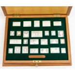 The Stamps of Royalty - A cased set of twenty-five sterling silver (925) stamps, with original