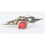 A continental Modernist brooch silver brooch, flame like textured d and plain metal details set to