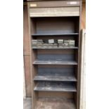 Steel workshop shelving unit with roller shutter. THIS ITEM IS OFF SITE AND SHOULD BE COLLECTED FROM