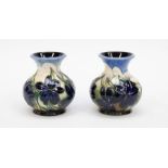 A boxed pair of Moorcroft Pottery miniature vases