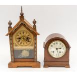 An early 20th century German mantel clock, together with a 1920s' mahogany mantel clock