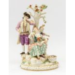 A 19th Century Meissen figural group of Apple Pickers, size 27cm high Condition  some damage and old
