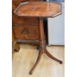 A 19th century mahogany wine table on tripod legs, together with a reproduction mahogany wine table