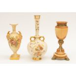 Three Royal Worcester blush ivory vases to include; A pedestal vase of lobed ovoid form, pierced