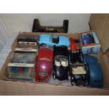 2 boxes of model cars some in boxes and some some AF , various ages (24)