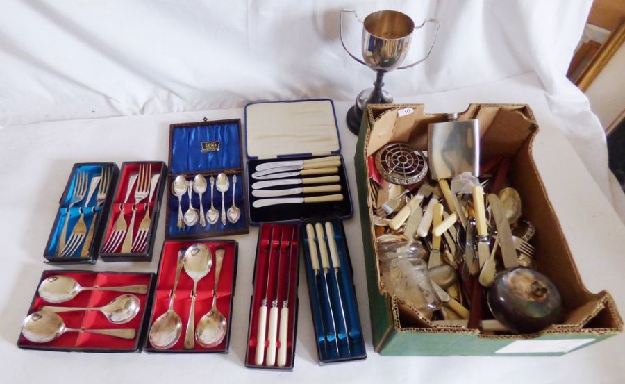 A plated lot to include 8 small boxed knife fork and spoon sets, and a box full of loose cutlery and