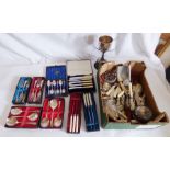 A plated lot to include 8 small boxed knife fork and spoon sets, and a box full of loose cutlery and