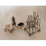 Pair of fully hallmarked Sterling silver toast racks and Sterling silver condiment set Total